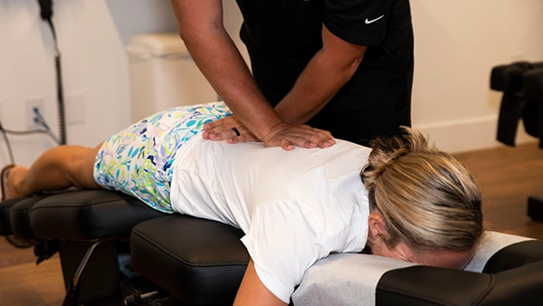 Chiropractor Coconut Creek FL Hunter Furman Adjusting Patient